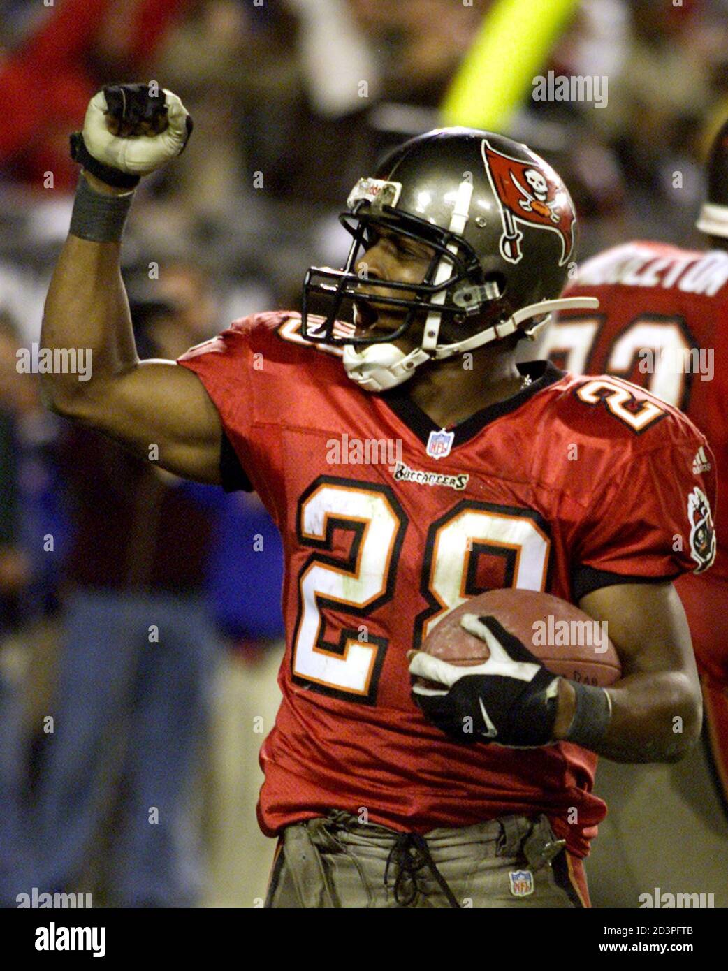 Tampa Bay Buccaneers' running back Warrick Dunn celebrates his game-winning  touchdown against the St. Louis