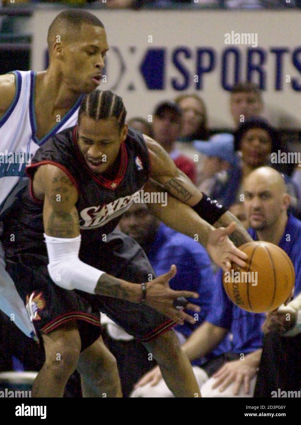 Philadelphia 76ers Guard Allen Iverson R Loses Control Of The Ball Under Defensive Pressure From Charlotte Hornets P J Brown February 24 01 During First Half Nba Action At The Charlotte Coliseum Rp Me Philadelphia 76ers Guard Allen Iverson R Loses Control Of The Ball Under Defensive Pressure From Charlotte Hornets P J Brown February 24 01 During First Half Nba Action At The Charlotte Coliseum Rp Me