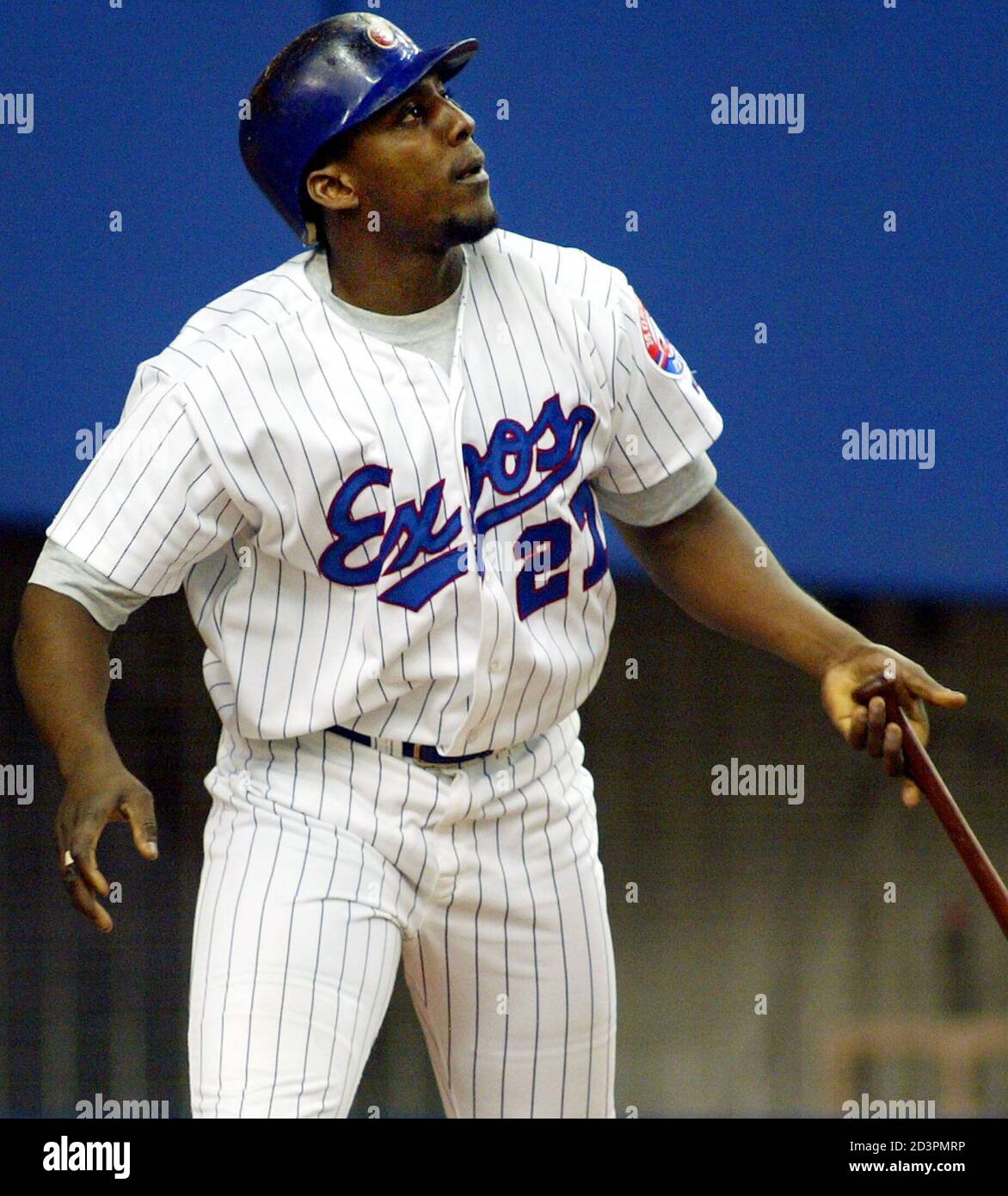 Montreal Expos' Vladimir Guerrero watches as he hits his 39th home run of  the season against Florida Marlins pitcher Carl Pavano during the fifth  inning of action at Olympic Stadium, September 24,