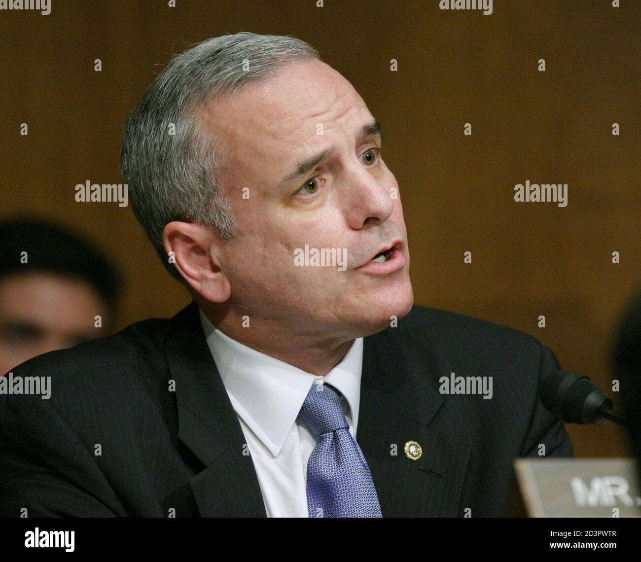 Senator Mark Dayton (D-MN) questions U.S. Secretary of Defense Donald Rumsfeld during his testimony on Iraq prison abuse before the Senate Armed Services Committee on Capitol Hill in Washington, May 7, 2004. Rumsfeld, under pressure to resign, warned that many more pictures showing cruel acts by U.S. personnel would follow those that have shocked the world, eroded Iraqi trust and further savaged the image of the United States in the Arab world. REUTERS/Molly Riley  MMR/JDP Stock Photo