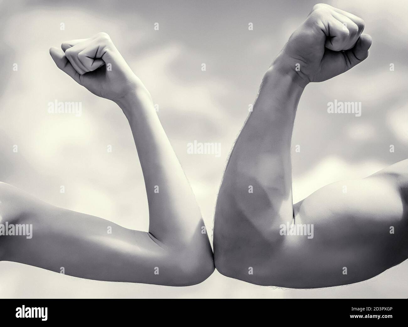 Muscular arm vs weak hand. Vs, fight hard. Competition, strength