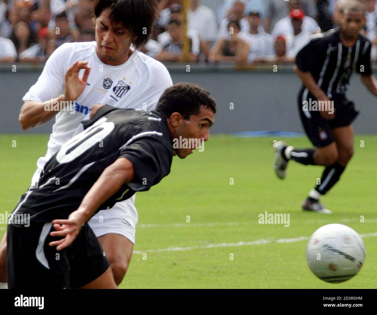 Argentine Carlos Tevez Front Of Corinthians Tries To Break Away From Avalos Of Santos During Their Paulista State Championship Match In The Port City Of Santos February 13 05 Reuters Jose Patricio Rr Argentine Carlos Tevez Front Of Corinthians Tries To Break Away From Avalos Of Santos During Their Paulista State Championship Match In The Port City Of Santos February 13 05 Reuters Jose Patricio Rr