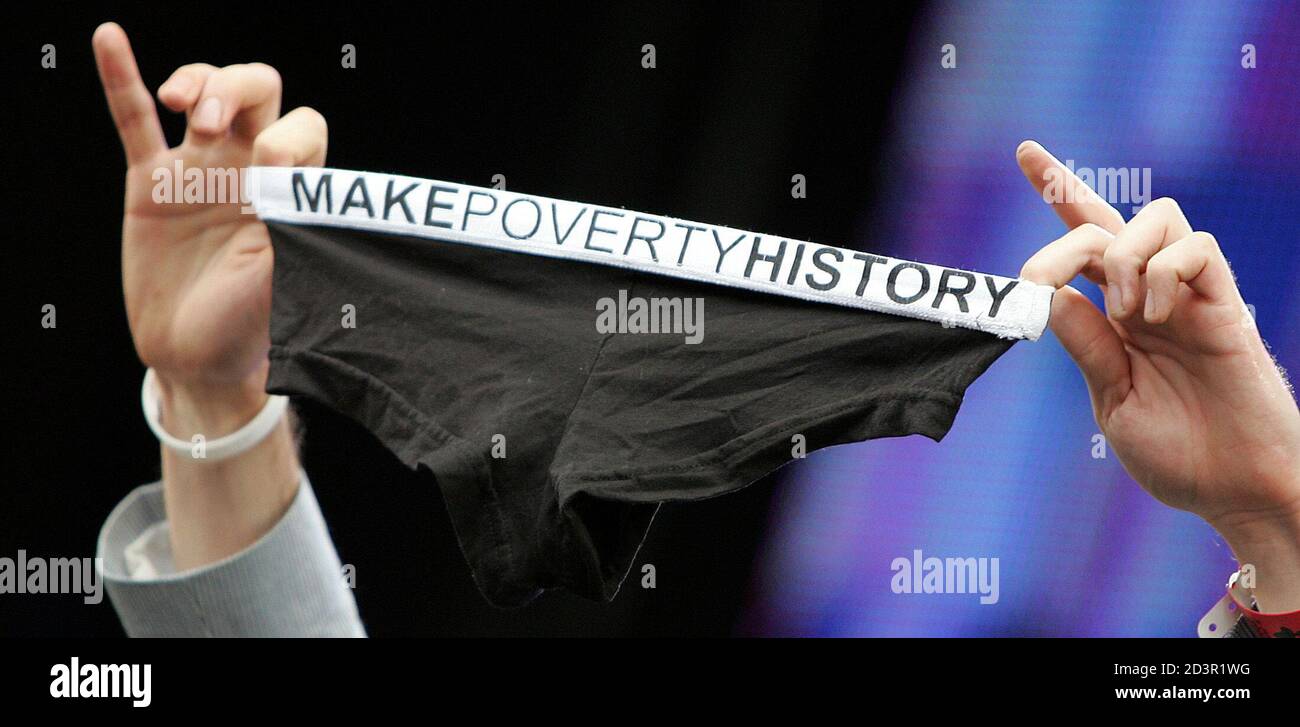 British rock star Fran Healy of the band Travis holds up underpants with  the words Make Poverty History on them as he performs at the Live 8 concert  in Hyde Park in