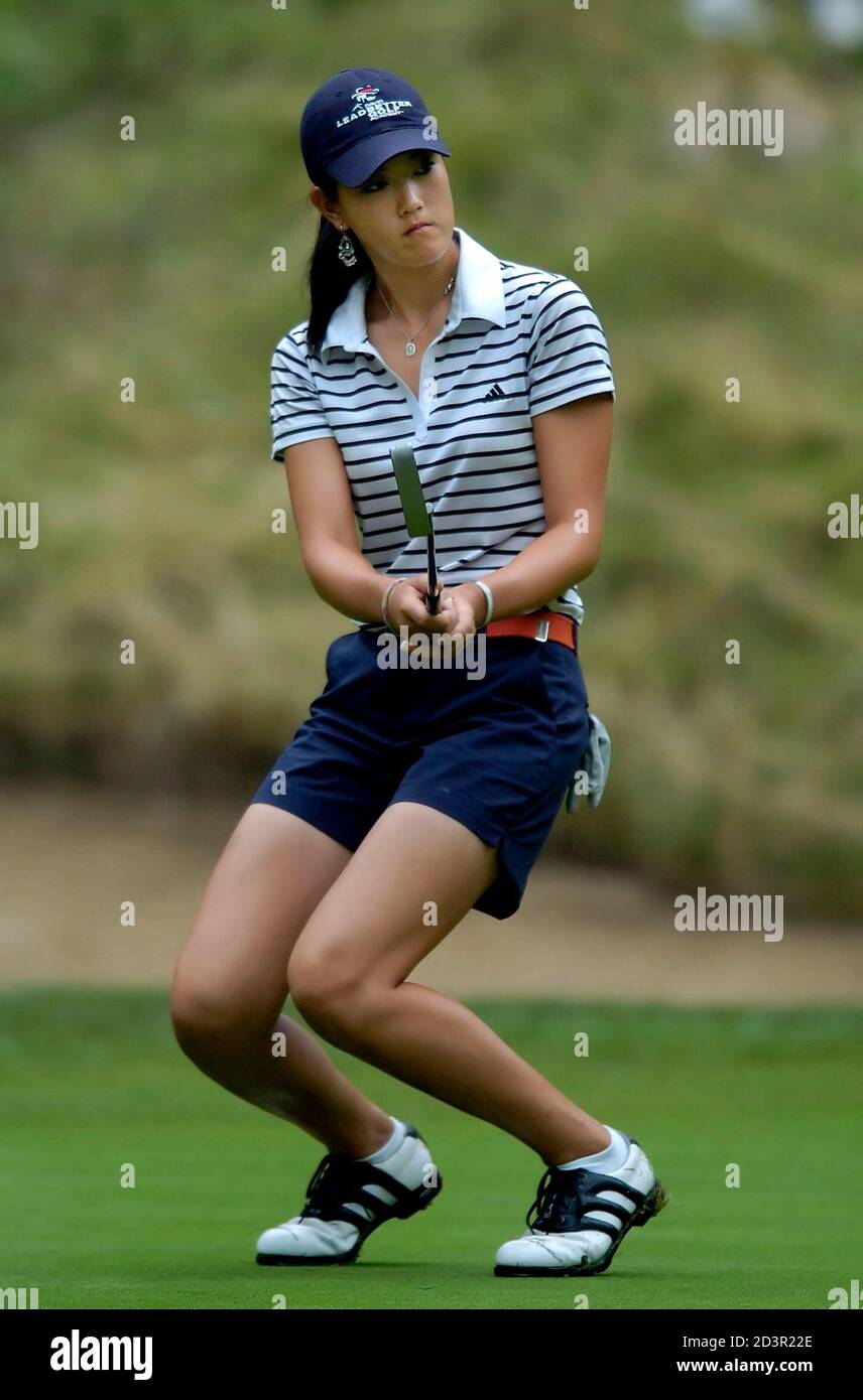 Wie of US reacts to her missed birdie putt on third hole in 2005 United States Amateur Public Links Championship in Ohio.  Michelle Wie of the U.S. reacts to her missed birdie putt on the third hole during the quarterfinal round of match play in the 2005 United States Amateur Public Links Championship at Shaker Run Golf Club in Lebanon, Ohio, July 15, 2005. Wie lost to Clay Ogden 5 and 4. REUTERS/John Sommers II Stock Photo