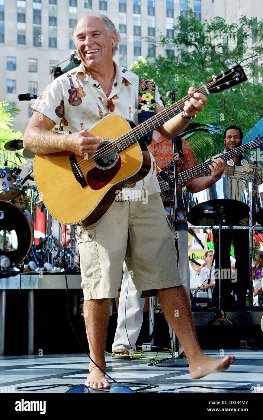 Singer Jimmy Buffett performs on NBC's Today Show during an outdoor concert  at New York's Rockefeller Center July 20, 2001. Buffett was appearing as  part of NBC's Summer Concert Series which features