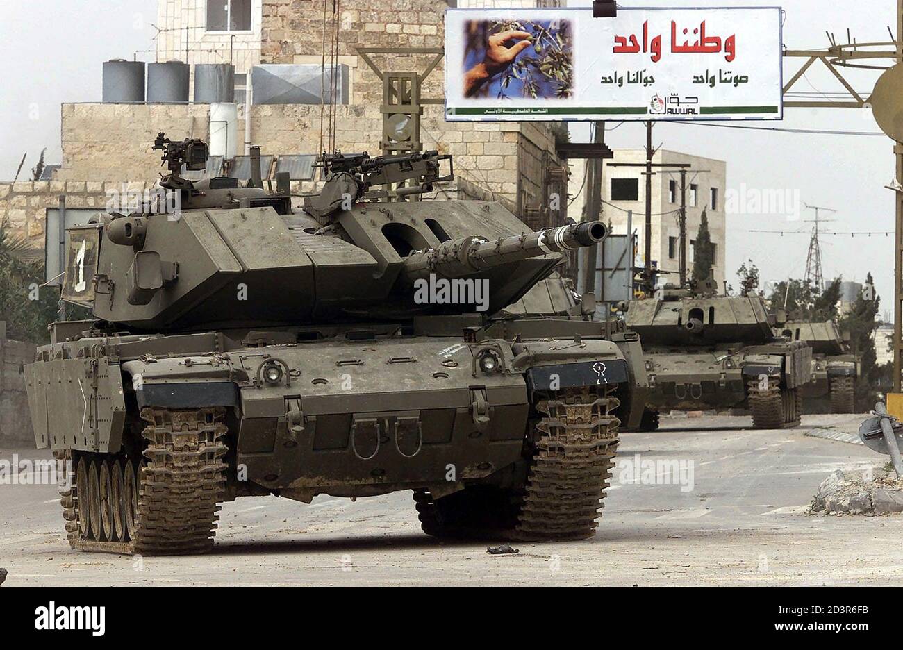 A Convoy Of Israeli Tanks Roll Along The Main Street Of Bethlehem ...