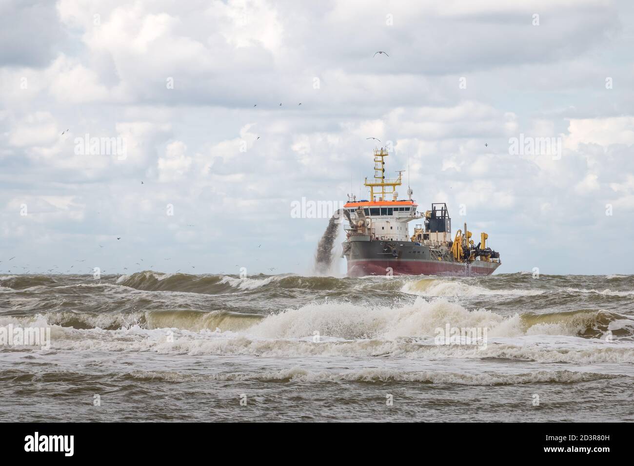 Dredger on the North Sea coast in the Netherlands, province of North Holland Stock Photo