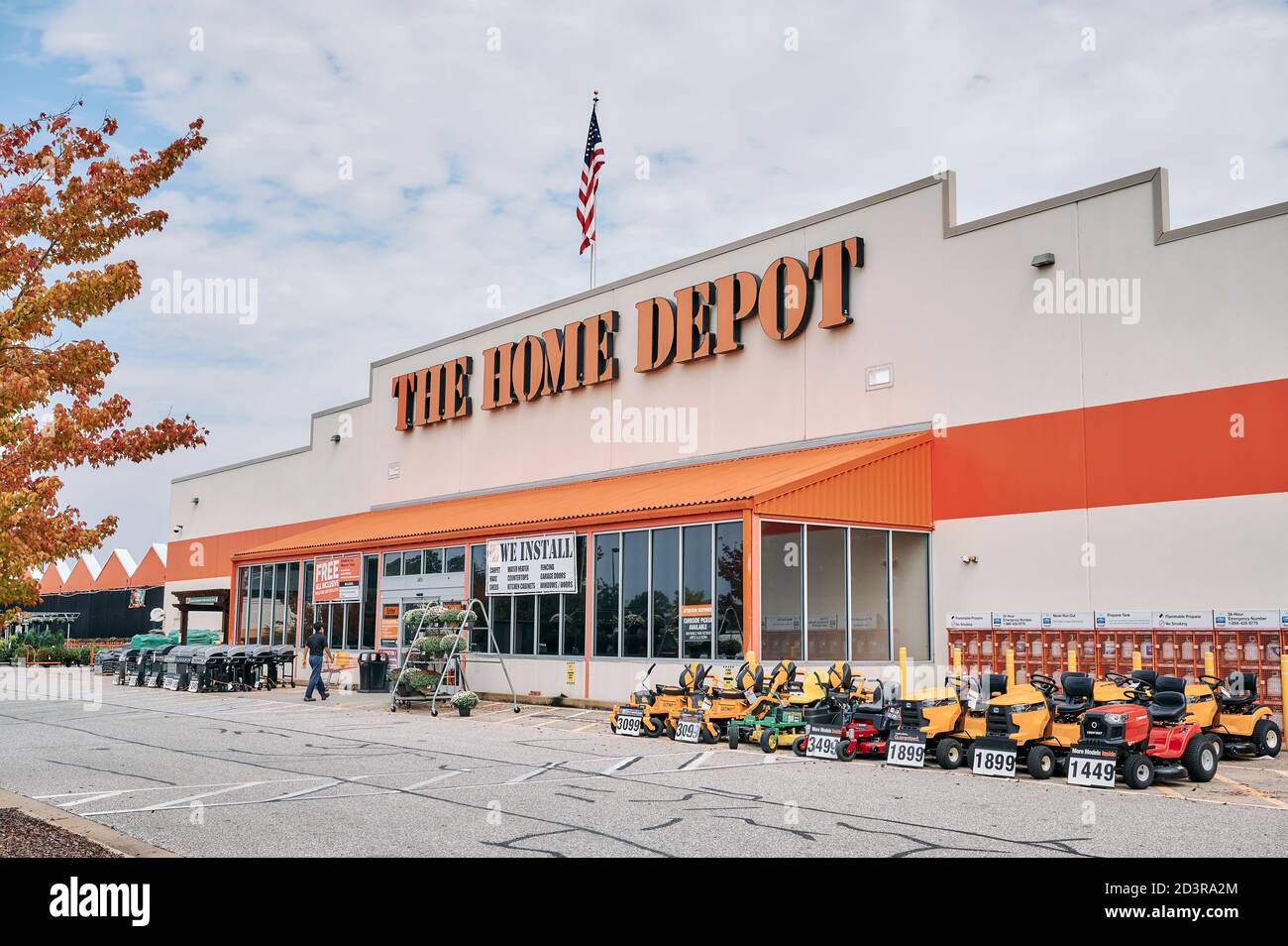Customer entering Home Depot home improvement store, a big box store, showing the sign and logo in Montgomery Alabama, USA. Stock Photo