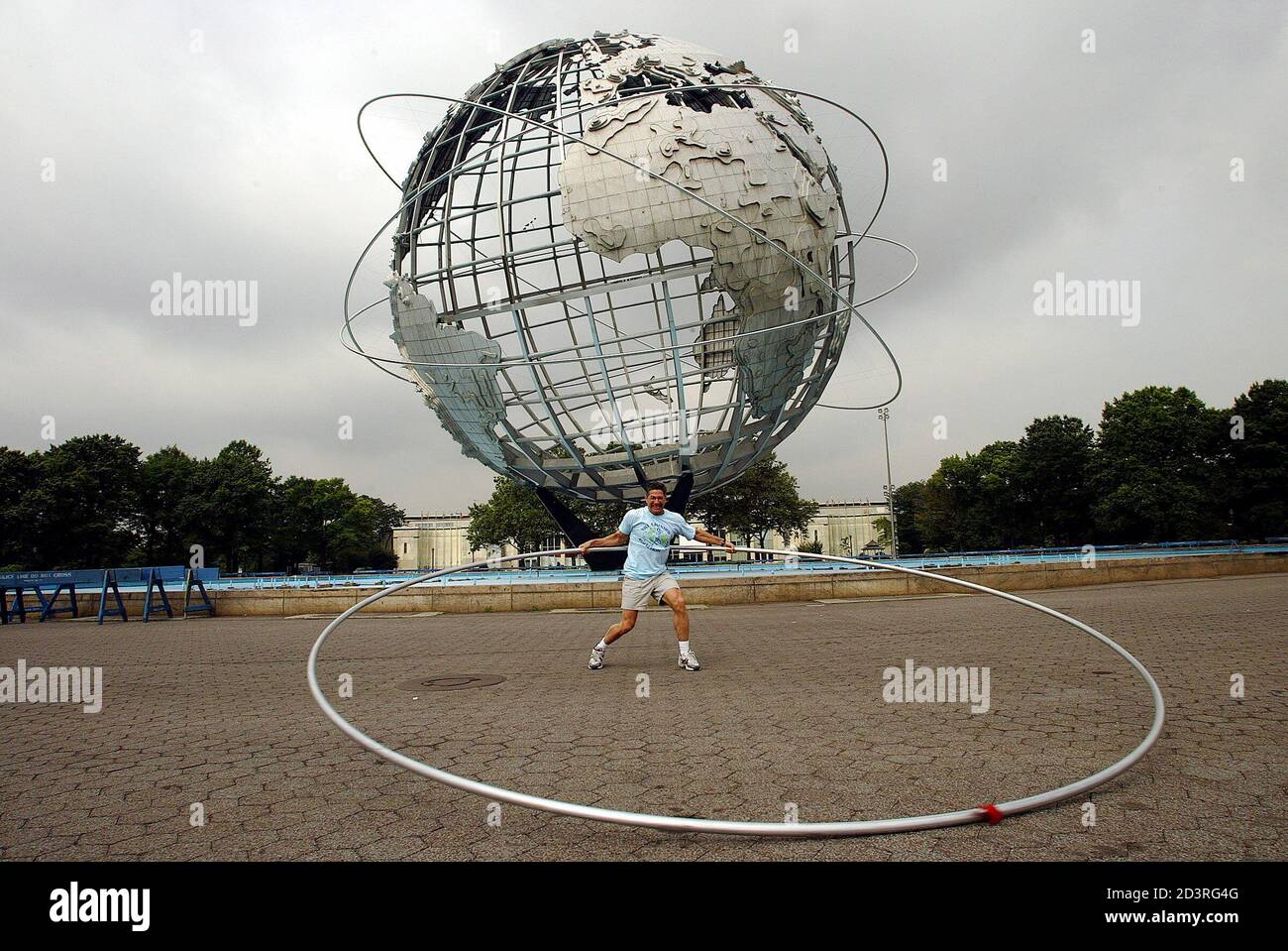 Ashrita Furman Attempts To Set The Guinness World Record For Hula Hooping  With The Largest Hula Hoop In New York's Flushing Meadow Park July 15,  2005. Furman, Who Holds The Guinness World