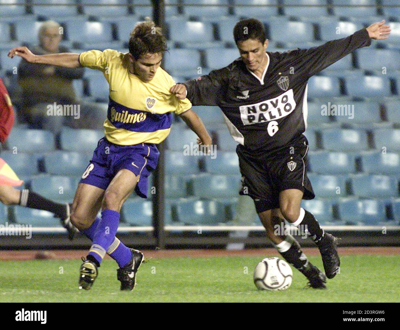 Jose Calvo L Of Argentine Soccer Club Boca Juniors Battles For The Ball With Ronildo Of