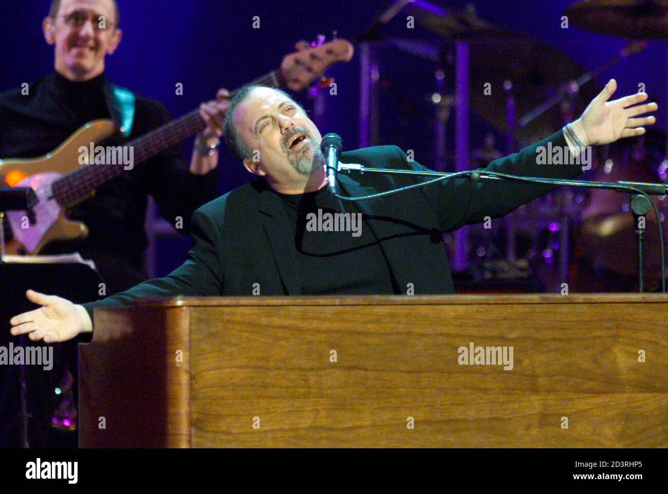 Singer Billy Joel performs [Brian Wilson\