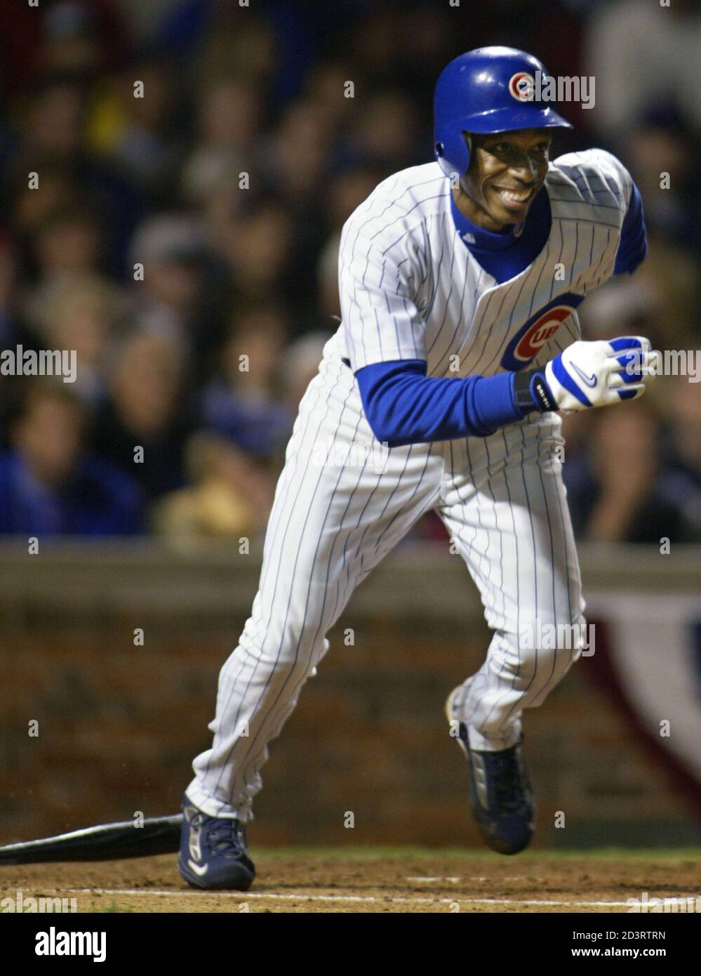 Chicago Cubs' Kenny Lofton reacts after grounding out to Florida Marlins  second baseman Luis Castillo during the second inning of play in Game 6 of  their NLCS Championship series at Wrigley Field