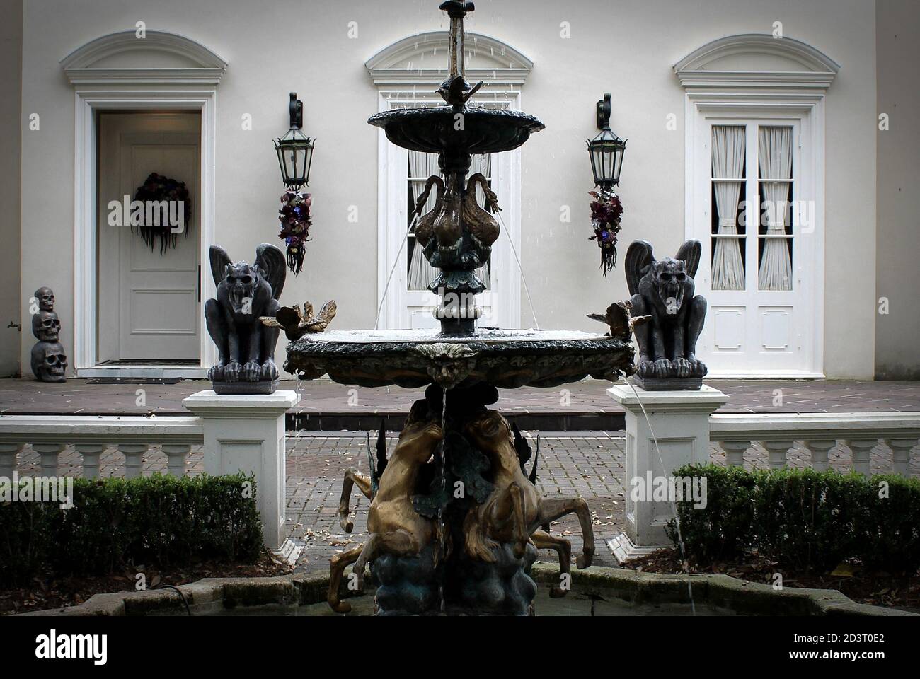 this elegant fountain is flanked by a pair of tough looking Halloween ...