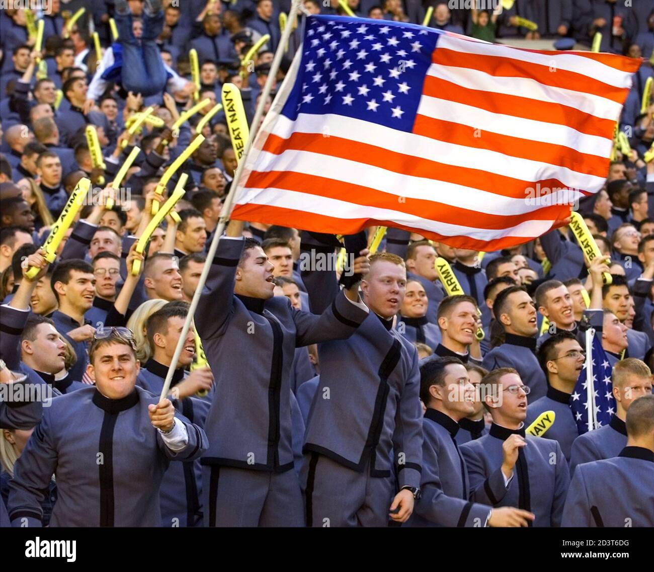 Army cadets, lead by Cadet Ryan Lisowski waving the American flag