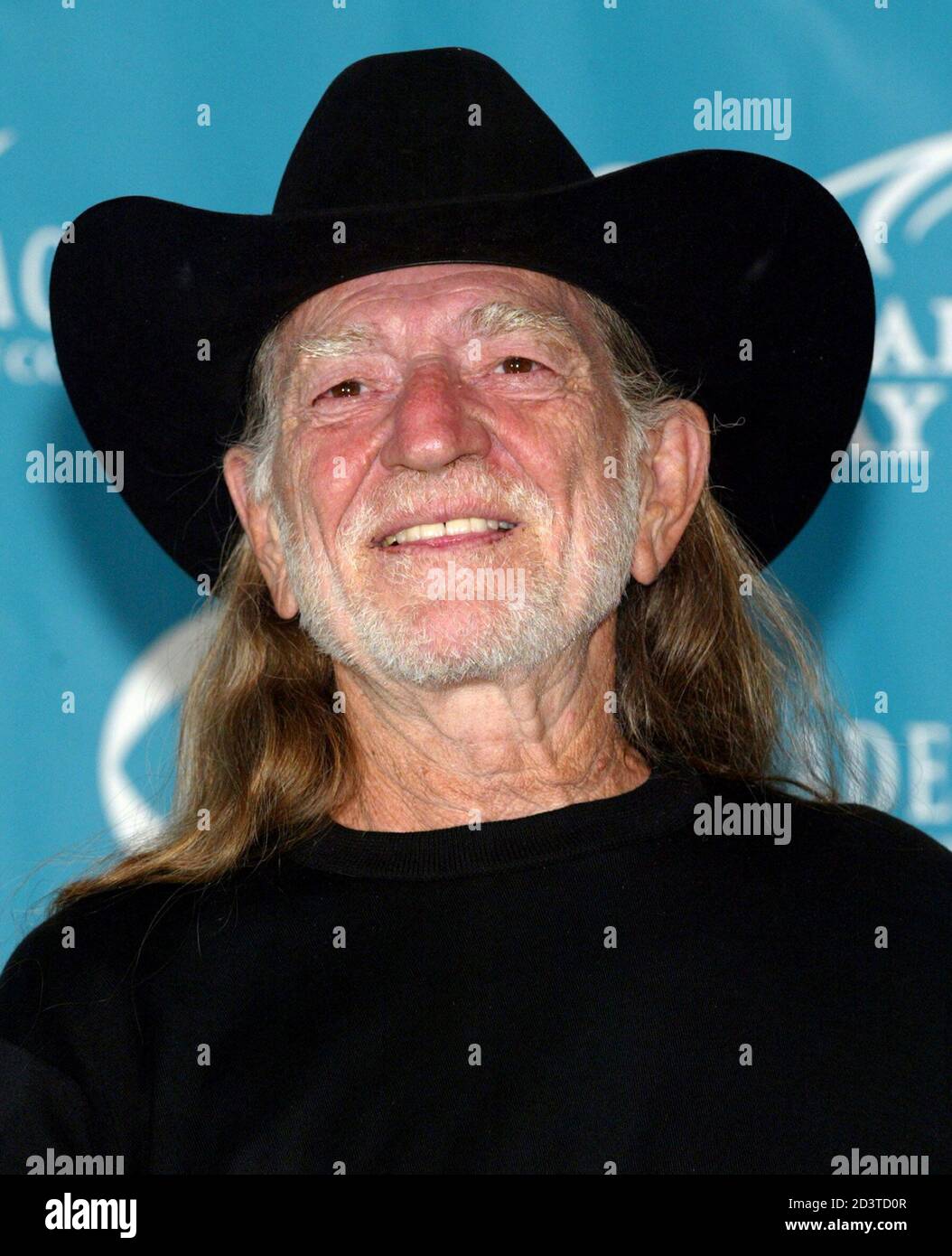 Country legend Willie Nelson smiles backstage at the 39th annual Academy of Country Music Awards at the Mandalay Bay Events Center in Las Vegas, Nevada, May 26, 2004. [Nelson received the Gene Weed Special Achievement Award at the show.] Stock Photo