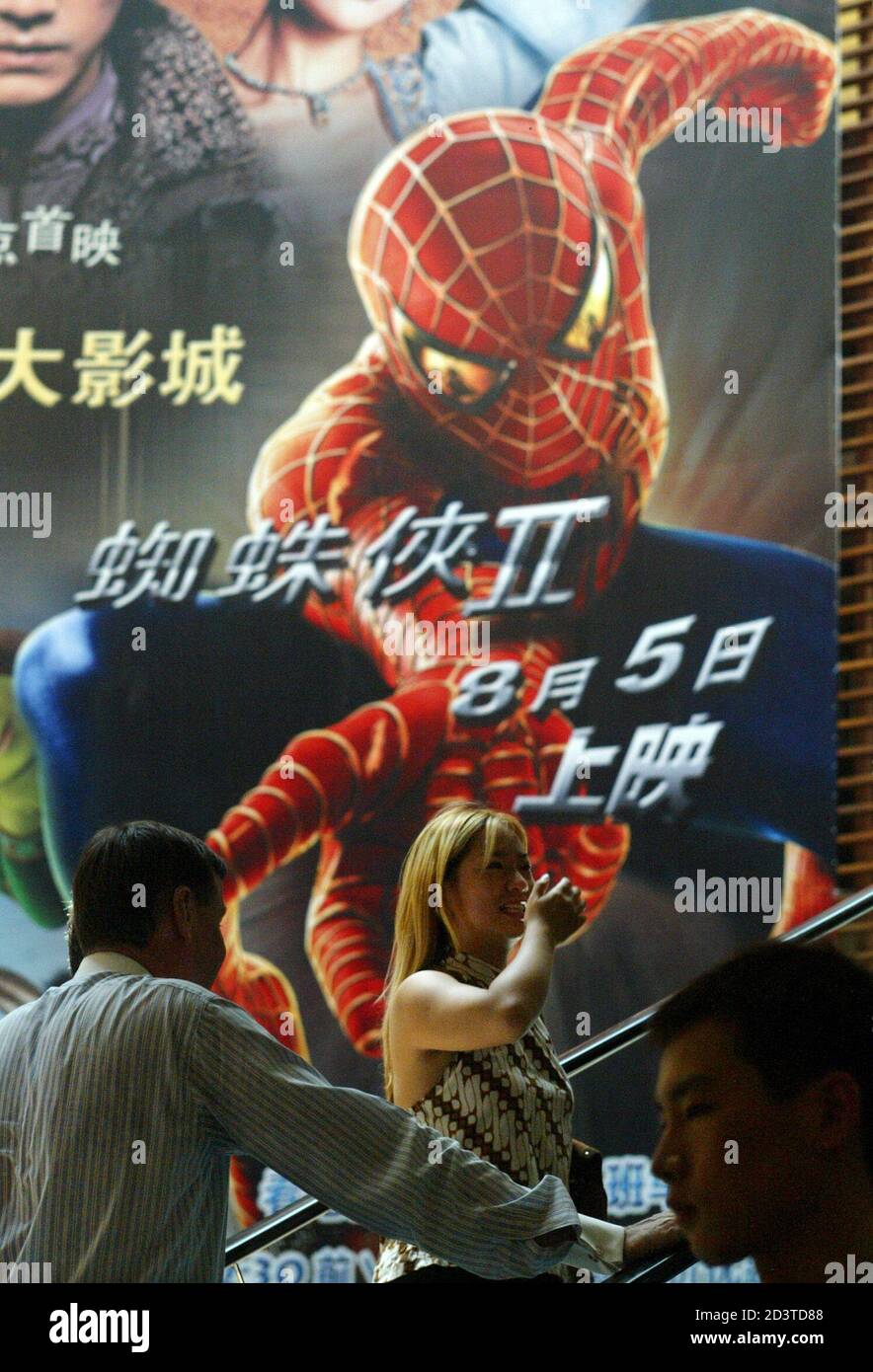 Shoppers Pass Under A Huge Advertisement Of Hollywood Blockbuster Spider Man 2 In Shanghai July 16 04 The Comic Book Adventure Spider Man 2 Which Snared A Record 40 5 Million In Its Box Office Web Shoppers Pass Under A Huge Advertisement Of Hollywood Blockbuster Spider Man 2 In Shanghai July 16 04 The Comic Book Adventure Spider Man 2 Which Snared A Record 40 5 Million In Its Box Office Web