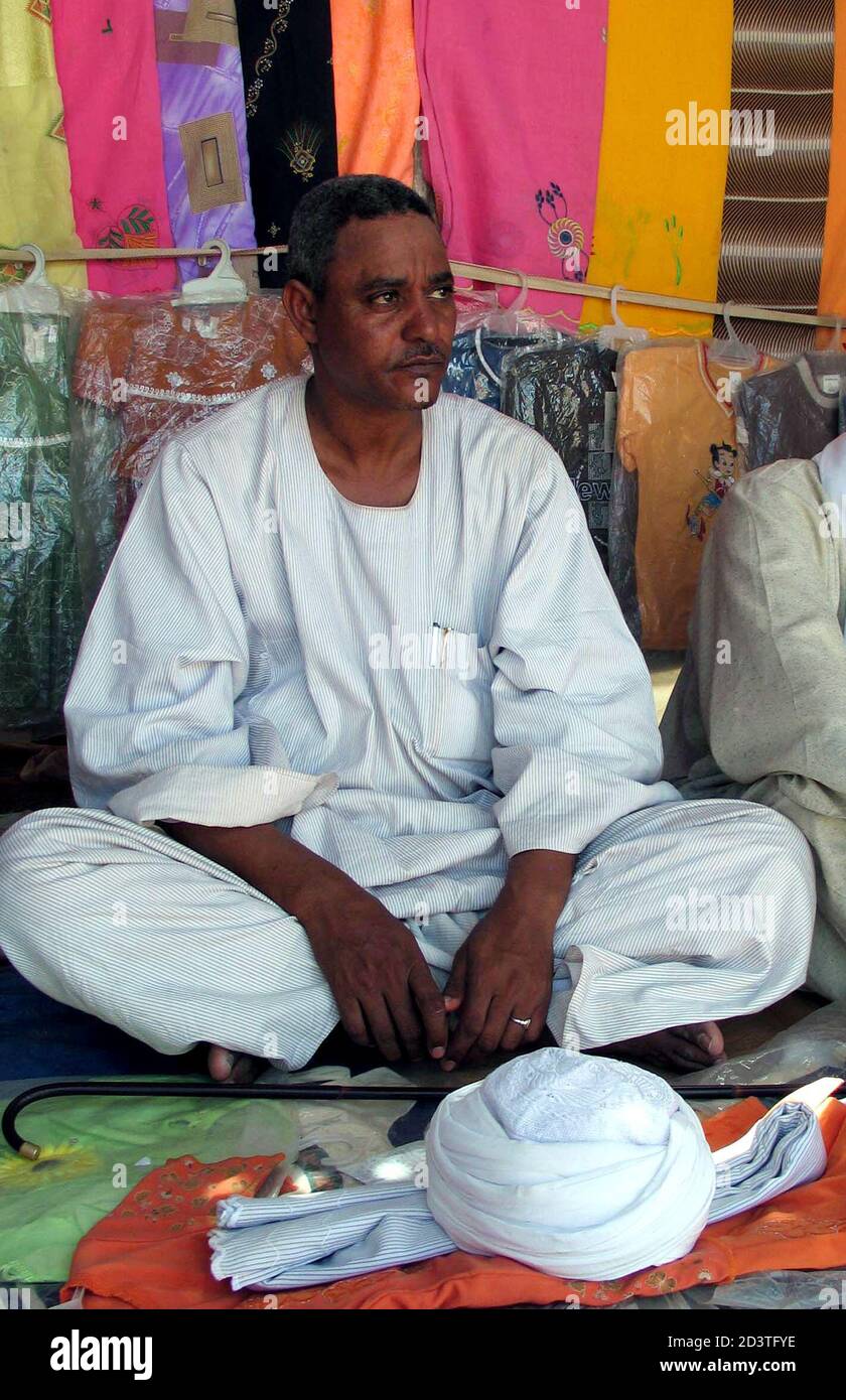 Musa Hilal, who heads Darfur's largest Arab tribe, is seen seated in a  clothes kiosk with his head gear on the ground in the northern Darfur town  of Kala May 8, 2005.