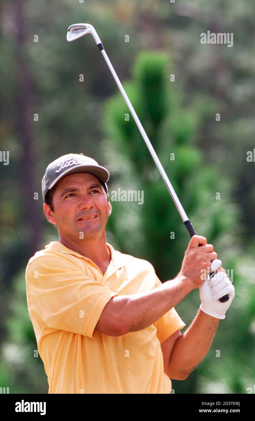 Jose Coceres of Buenos Aires, Argentina, watches his tee shot on the third  hole at the National Car Rental Classic golf tournament October 20, 2001.  Coceres began the round with an -11