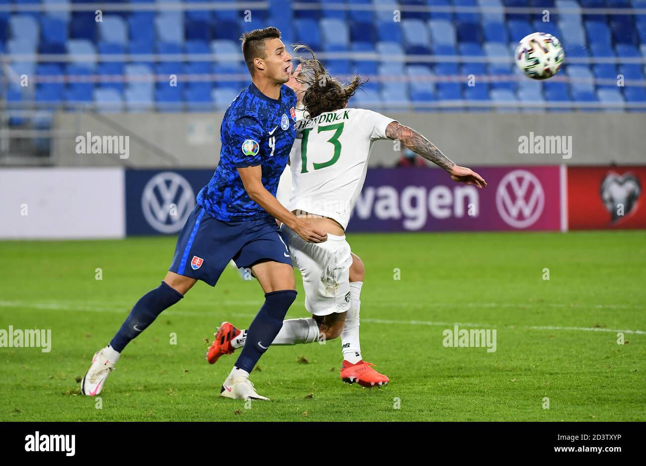 Republic of Ireland's Jeff Hendrick (right) goes to ground in the penalty area after a challenge by Slovakia's Martin Valjent during the UEFA Euro 2020 Play-Off semi final match at the Narodny Futbalovy, Bratislava. Stock Photo