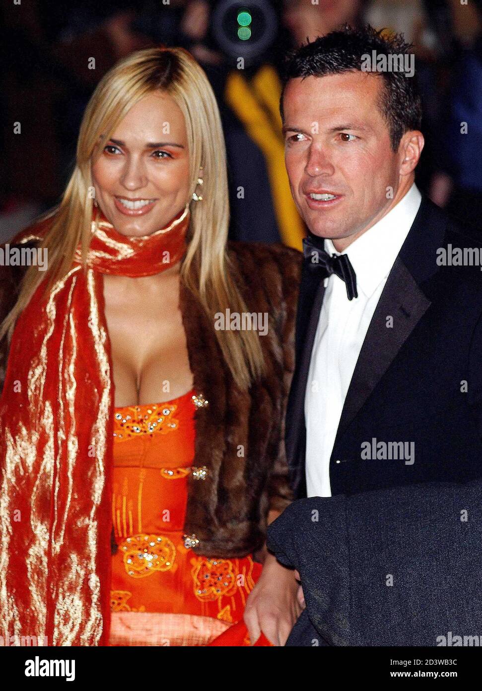 German footballer Lothar Matthaeus and his unidentified partner arrive at  the Natural History museum, London for an award ceremony to celebrate the  FIFA 100 top football players, March 4, 2004. Brazilian striker