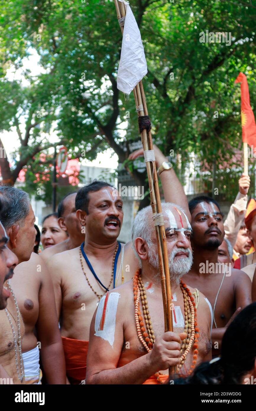 BENGALURU, INDIA - Apr 09, 2017: South Indian Hindu monk priest doing Puja - offering to gods Stock Photo