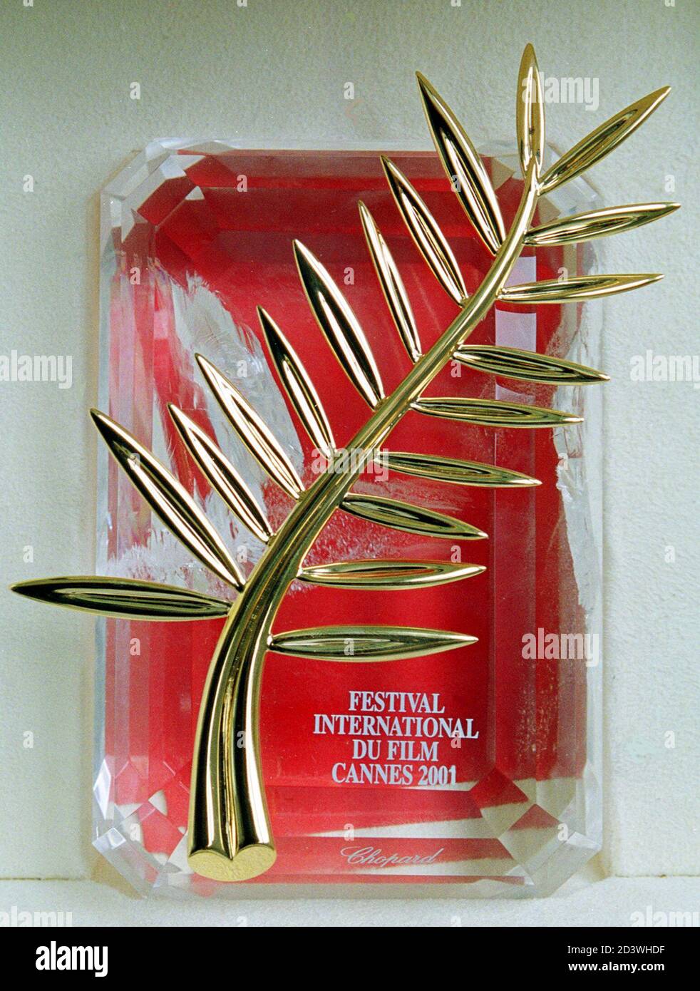 The Trophy Of The Cannes Film Festival A 18 Carat Gold Plated 1 Gramme Twig Set On A Rock Crystal Cushion On Display At Chopard S Headquarters In Geneva May 3 01 Swiss Jeweller Chopard