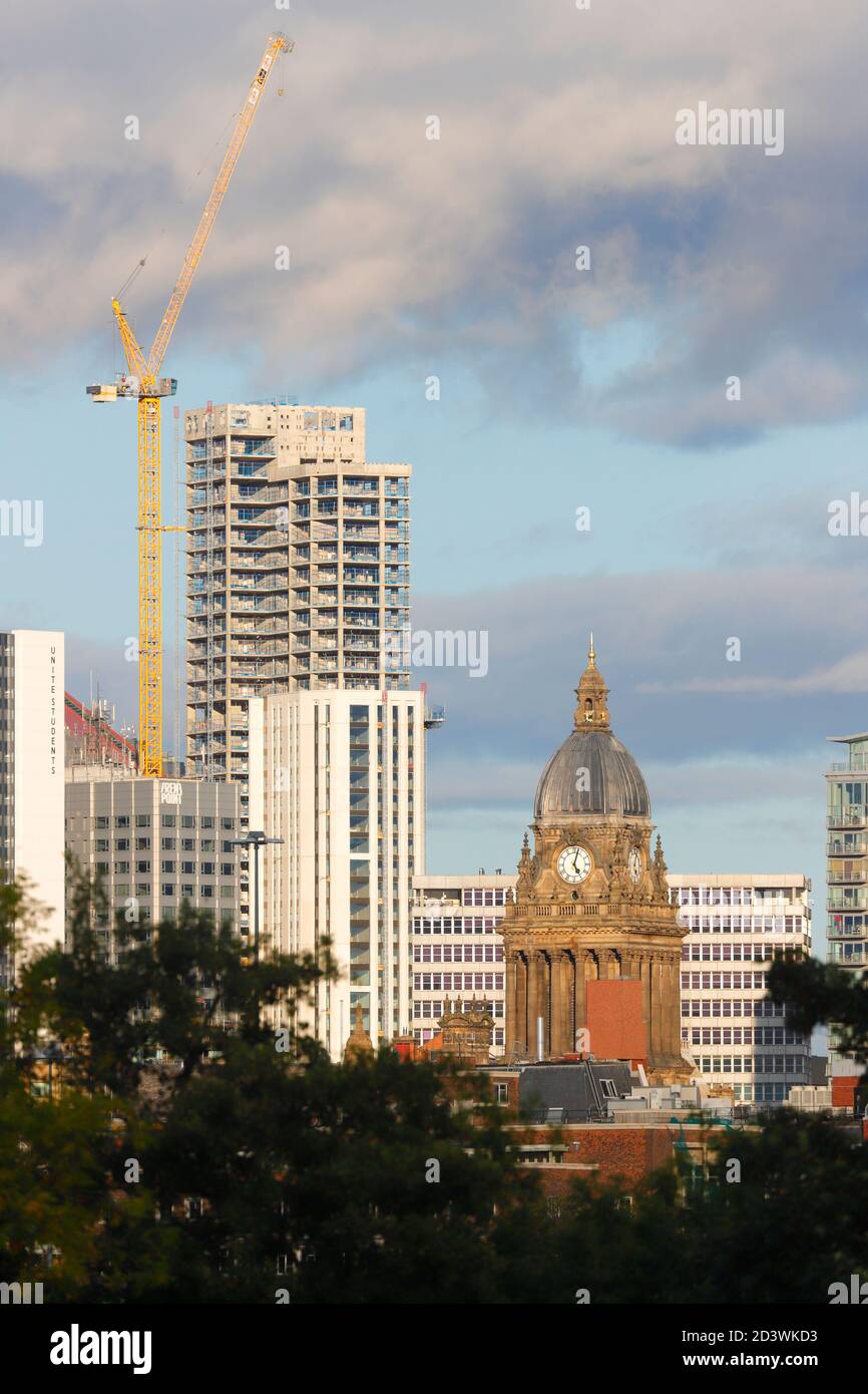 Yorkshire's tallest building 'Altus House' under construction and Leeds Town Hall clock tower in