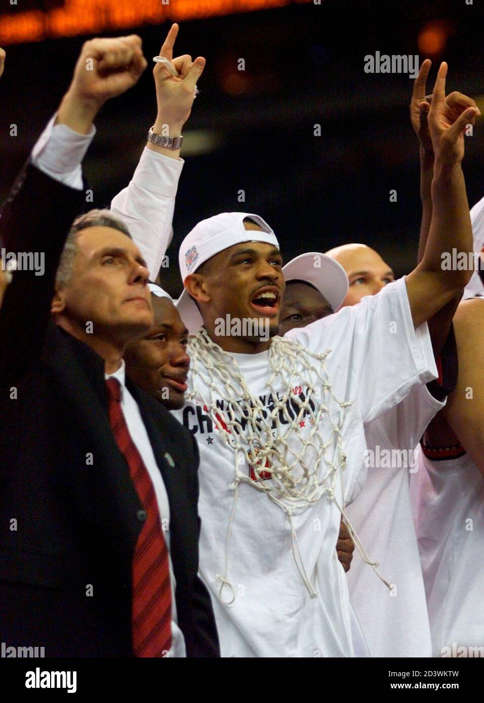 University of Maryland head coach Gary Williams (L) celebrates with players including guard Earl Badu (C) and guard Juan Dixon (R) after their 64-52 win over Indiana University in their men's NCAA University of Maryland head coach Gary Williams (L) celebrates with players including guard Earl Badu (C) and guard Juan Dixon (R) after their 64-52 win over Indiana University in their men's NCAA