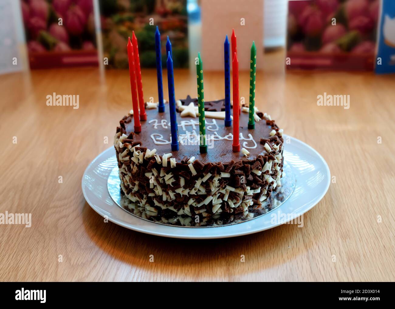 chocolate birthday cake with candles Stock Photo - Alamy