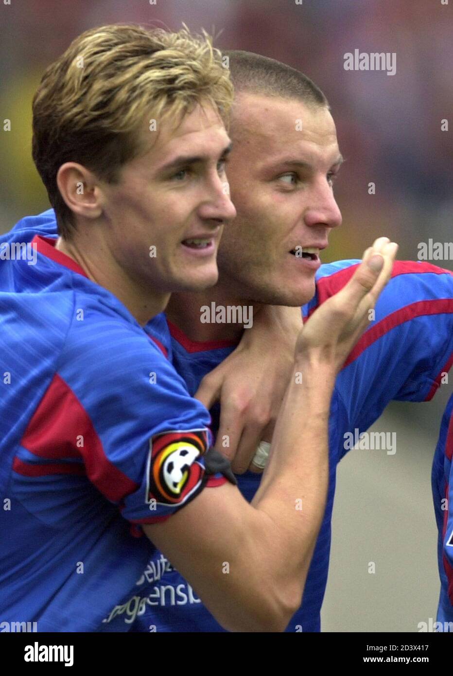 Miroslav Klose L And Tomasz Klos Of German First Division Soccer Team 1 Fc Kaiserslautern Celebrate