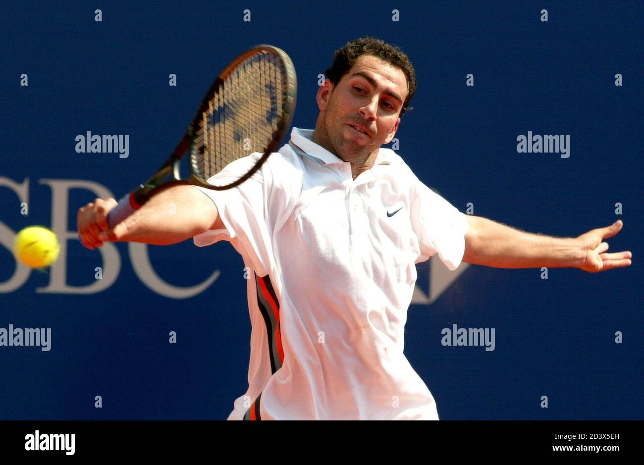 Albert Costa Of Spain Returns The Ball To His Compatriot Alberto Martin In The Third Round Match Of The Monte Carlo Tennis Open In Monaco April 18 2002 Costa Defeated Martin 7 5