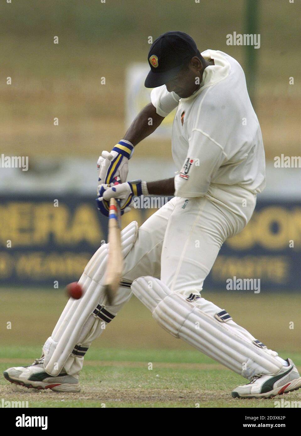 Sri Lankan batsman Naveed Nawas plays a shot during the third day of the second cricket test between Sri Lanka and Bangladesh at Singhalese Sports Club ground in Colombo, Sri Lanka on July 30, 2002. REUTERS/Anuruddha Lokuhapuarachchi  AL/CP Stock Photo