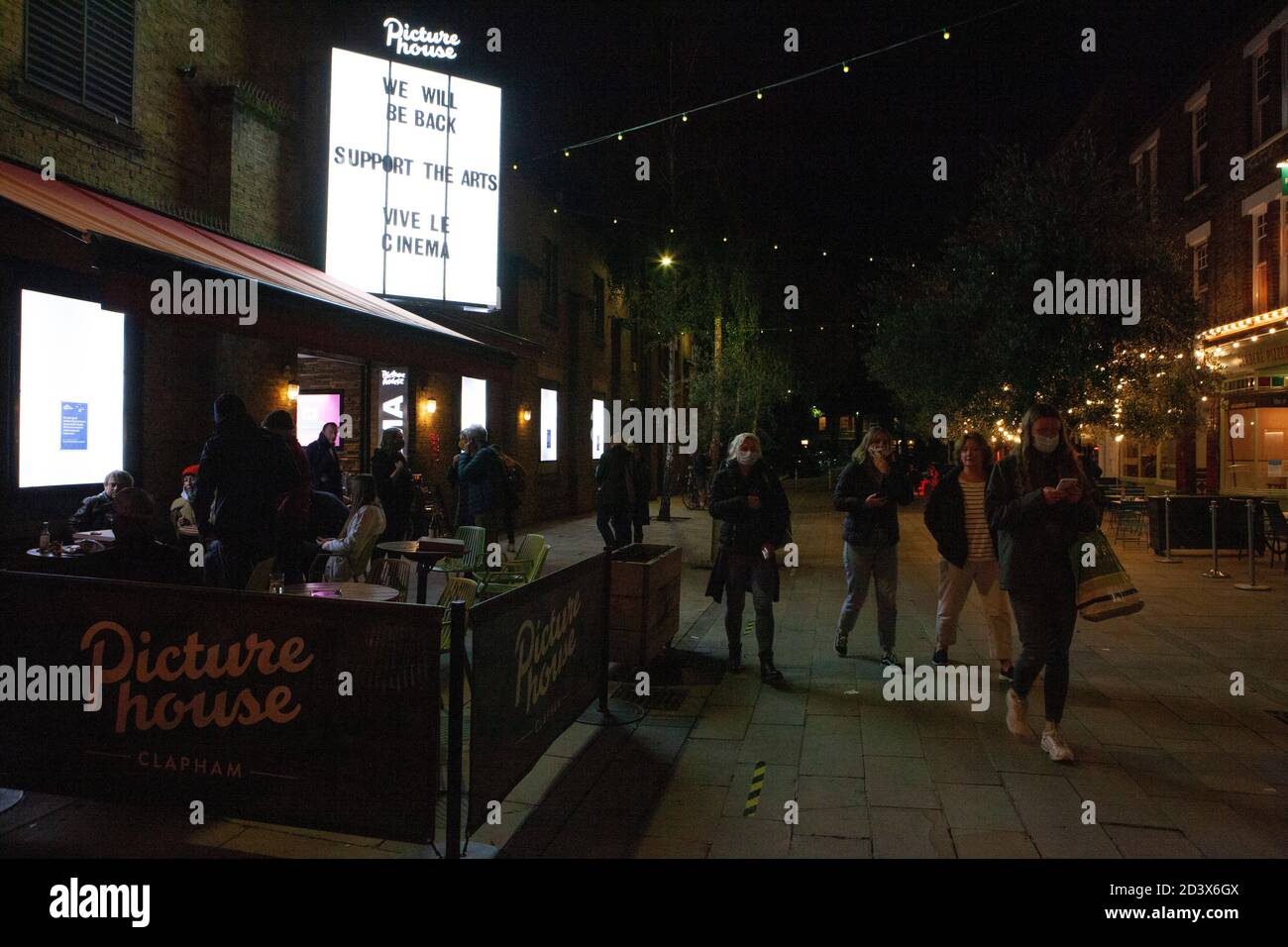 Clapham, London, UK, 8 October 2020: Clapham Picturehouse and all other cinemas in the Cineworld chain closed their doors tonight until March 2021. During the evening the film titles were replaced with the messages, 'We will be back. Support the arts. Vive le cinema.' Anna Watson/Alamy Live News Stock Photo