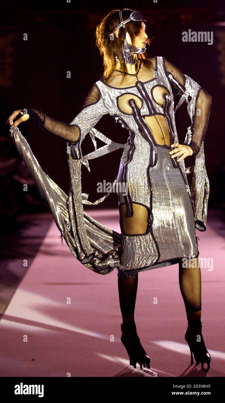 A model wears one of French fashion designer Jean-Paul Gaultier's creations  during one of a series of catwalk shows in London's Victoria and Albert  Museum, May 30, 2003. The fashion walks are