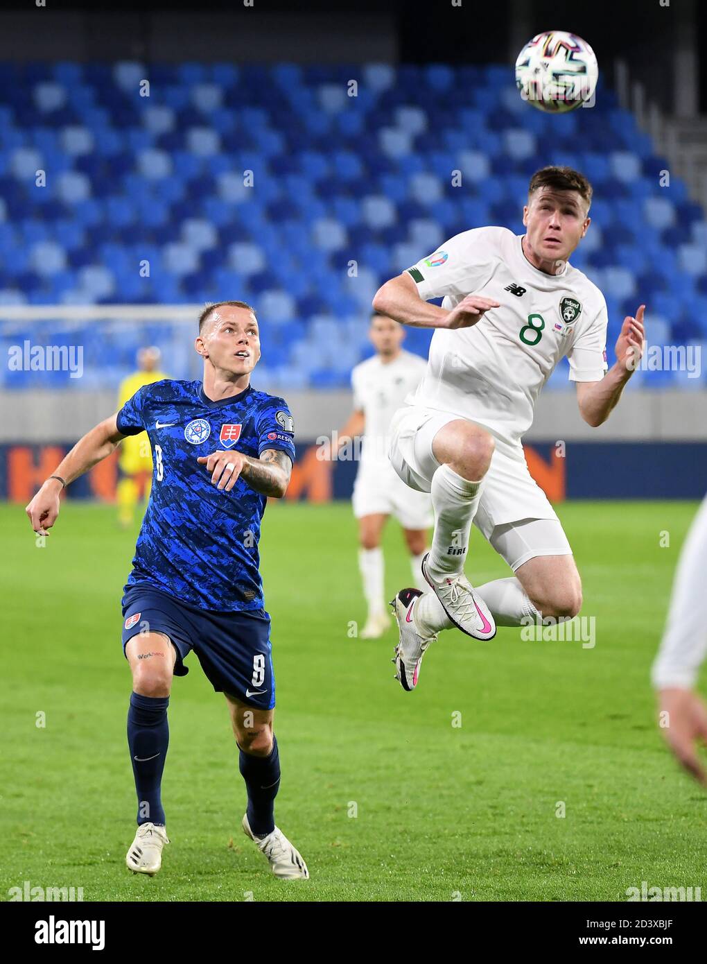 Slovakia's Ondrej Duda (left) and Republic of Ireland's James McCarthy in action during the UEFA Euro 2020 Play-Off semi final match at the Narodny Futbalovy, Bratislava. Stock Photo