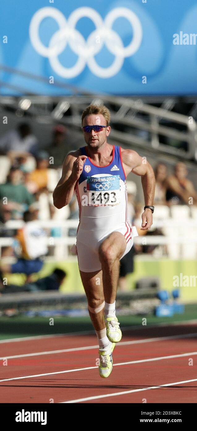 Czech Republic's Tomas Dvorak runs in the men's 100 metres event of the  decathlon at the Athens 2004 Olympic Games. Czech Republic's Tomas Dvorak  runs in heat one of the men's 100
