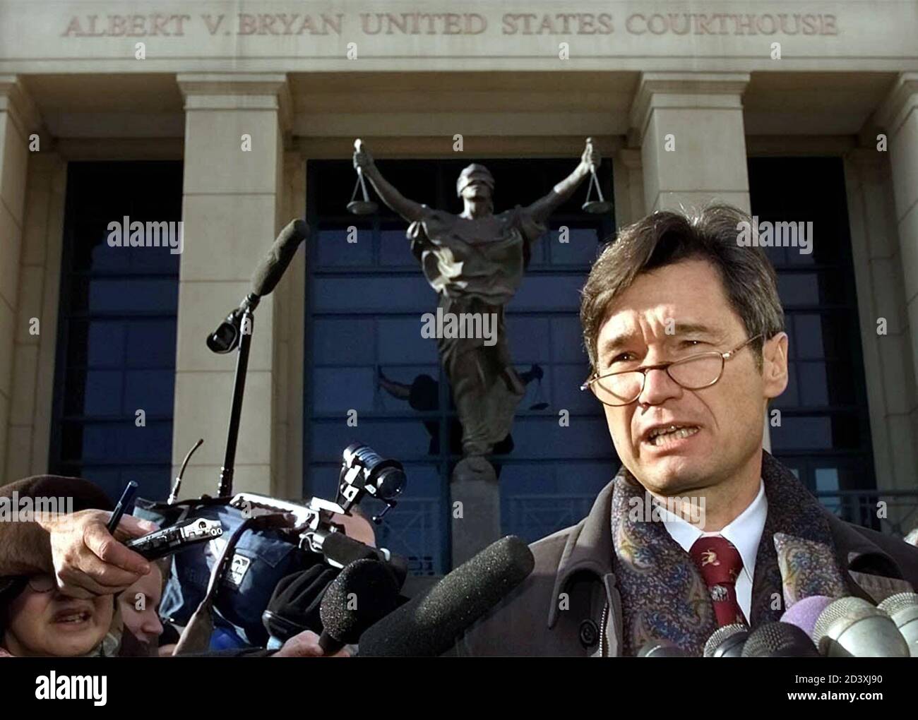 Francois Roux, the attorney [representing the mother of Zacarias Moussaoui, speaks outside the Albert Bryan U.S. Courthouse in Alexandria, Virginia January 2, 2002. Roux said Moussaoui's mother, Aicha el-Wafi, said she decided not to attend the hearing.] Stock Photo