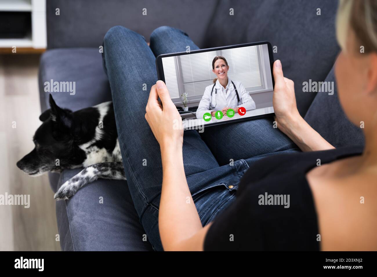 Web Video Conference Call With Doctor On Tablet Computer Stock Photo