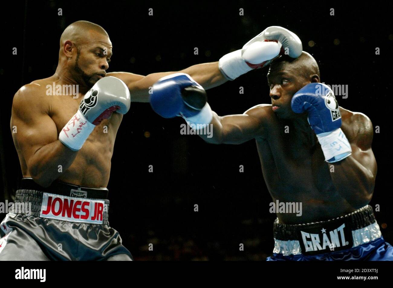 WBC light heavyweight champion Roy Jones Jr. (L) of Pensacola, Florida and Antonio Tarver of Orlando, Florida mix it up in the second round of their title fight at the Mandalay Bay Events Center in Las Vegas, Nevada, May 15, 2004. Tarver won the fight after knocking out Jones later in the round. Stock Photo