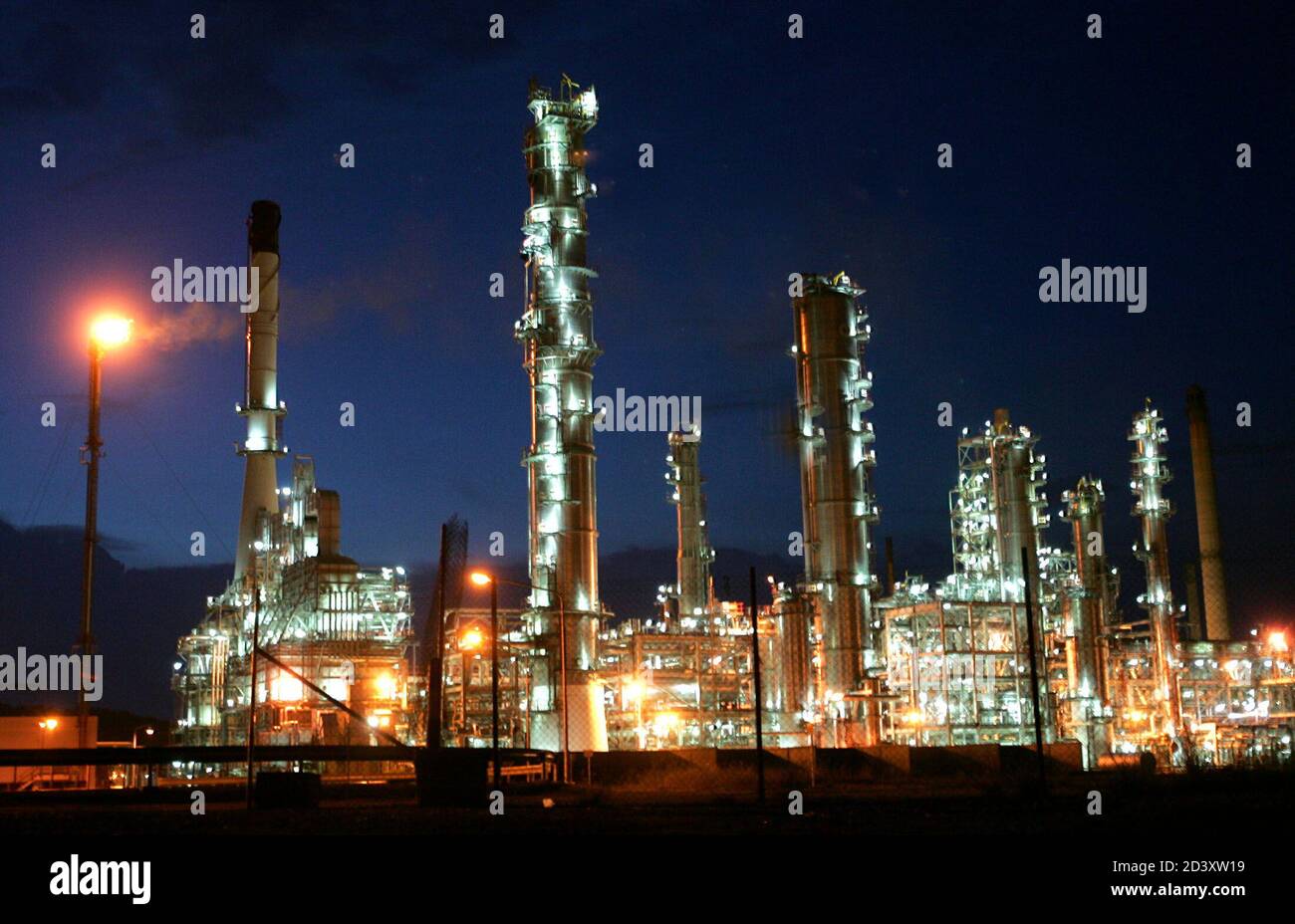 Thailand S Largest Oil Refinery Thai Oil Lights Up In The Evening In This Picture Taken August 17 04 In The Eastern Town Of Sri Racha 100 Km 62 Miles From Bangkok Thai