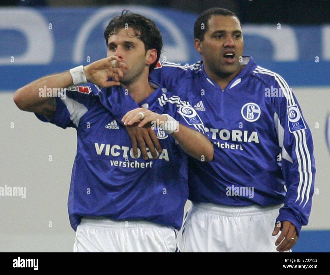 schalke-04s-brazilian-lincoln-l-and-ailton-celebrate-a-goal-against-bayern-munich-during-their-german-bundesliga-soccer-match-in-gelsenkirchen-schalke-04s-brazilian-lincoln-l-and-ailton-celebrate-a-goal-against-bayern-munich-during-their-german-bundesliga-soccer-match-in-gelsenkirchen-march-13-2005-reutersina-fassbender-2D3XY52.jpg