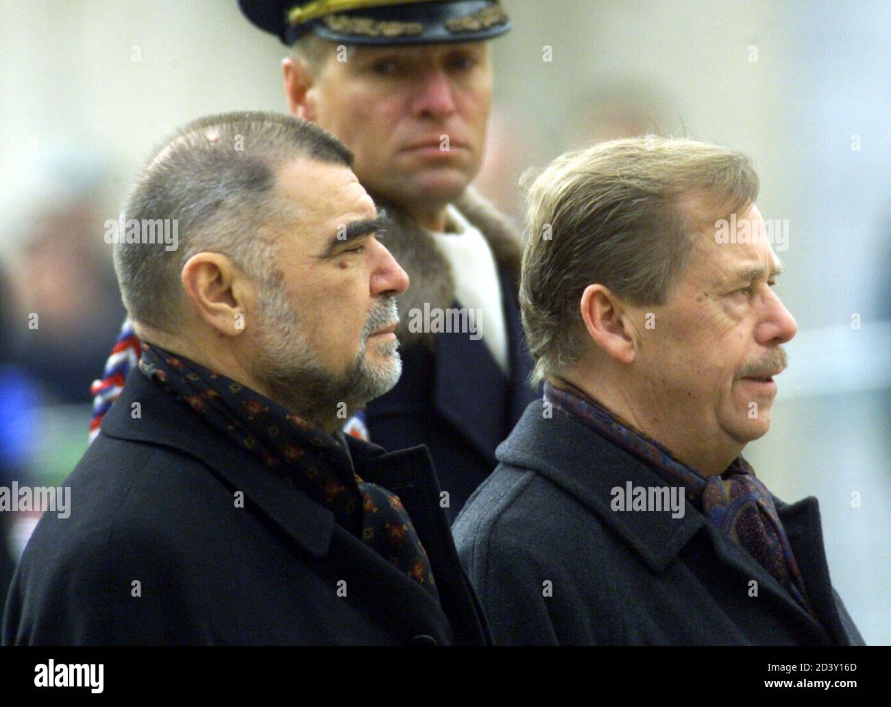 A Castle Guard officer (rear) looks at Croatian President Stjepan Mesic (L) and his Czech host President Vaclav Havel (R) during the official welcoming ceremony at Prague Castle on March 6, 2001. The Croatian President is on a short state visit to the Czech Republic.  PJ/WS Stock Photo