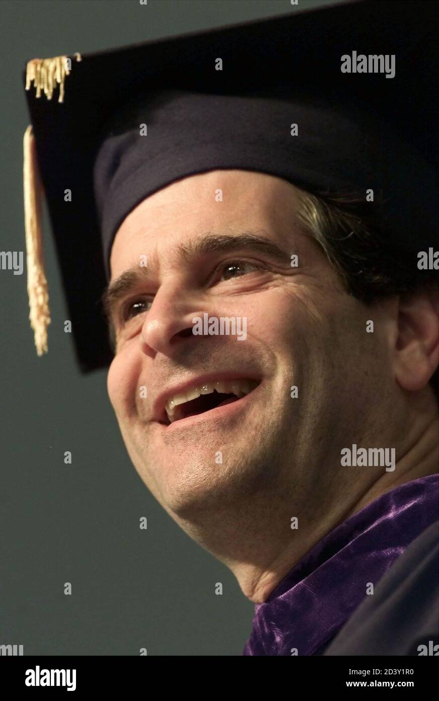 Dean Kamen, the founder of DEKA Research, whose mysterious invention  nicknamed "Ginger" or "It" sparked an explosion of media coverage in early  2001, smiles as he speaks to graduates May 19, 2001