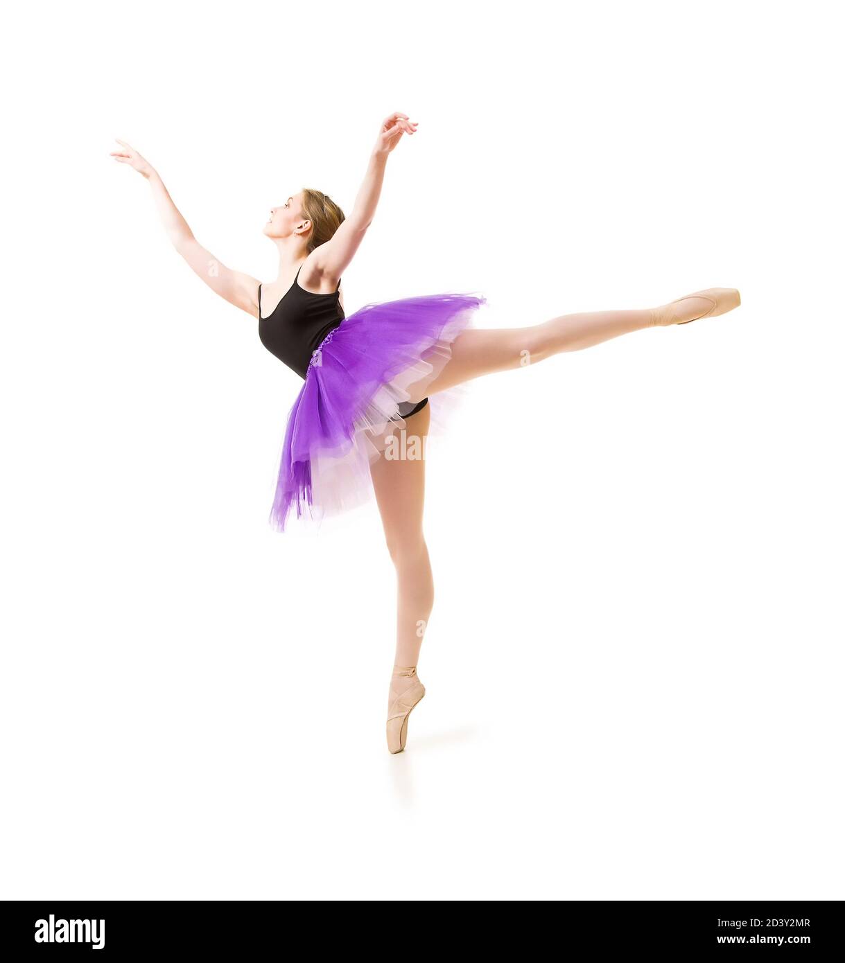 woman in purple tutu and black leotard dance ballet. Studio shot on