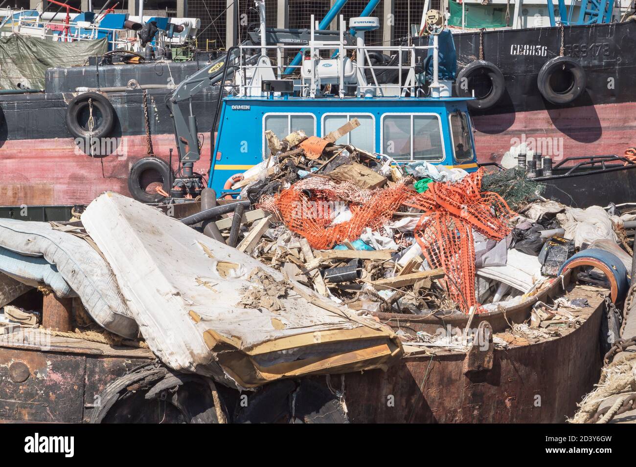 A garbage collection boat, Genoa, Liguria, Italy, Europe Stock Photo