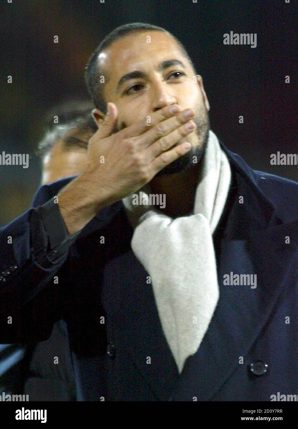 Perugia's Al-Saadi Gaddafi waves to supporters before the UEFA Cup second round, first leg match against Aris at the Renato Curi Stadium in Perugia November 6, 2003. The failing of a drugs test by Al-Saadi Gaddafi, son of Libyan leader Colonel Muammar Gaddafi, is an embarrassing turn in the already strange story of the Libyan's high-profile involvement in Italian football. REUTERS/Giampiero Sposito  GS Stock Photo
