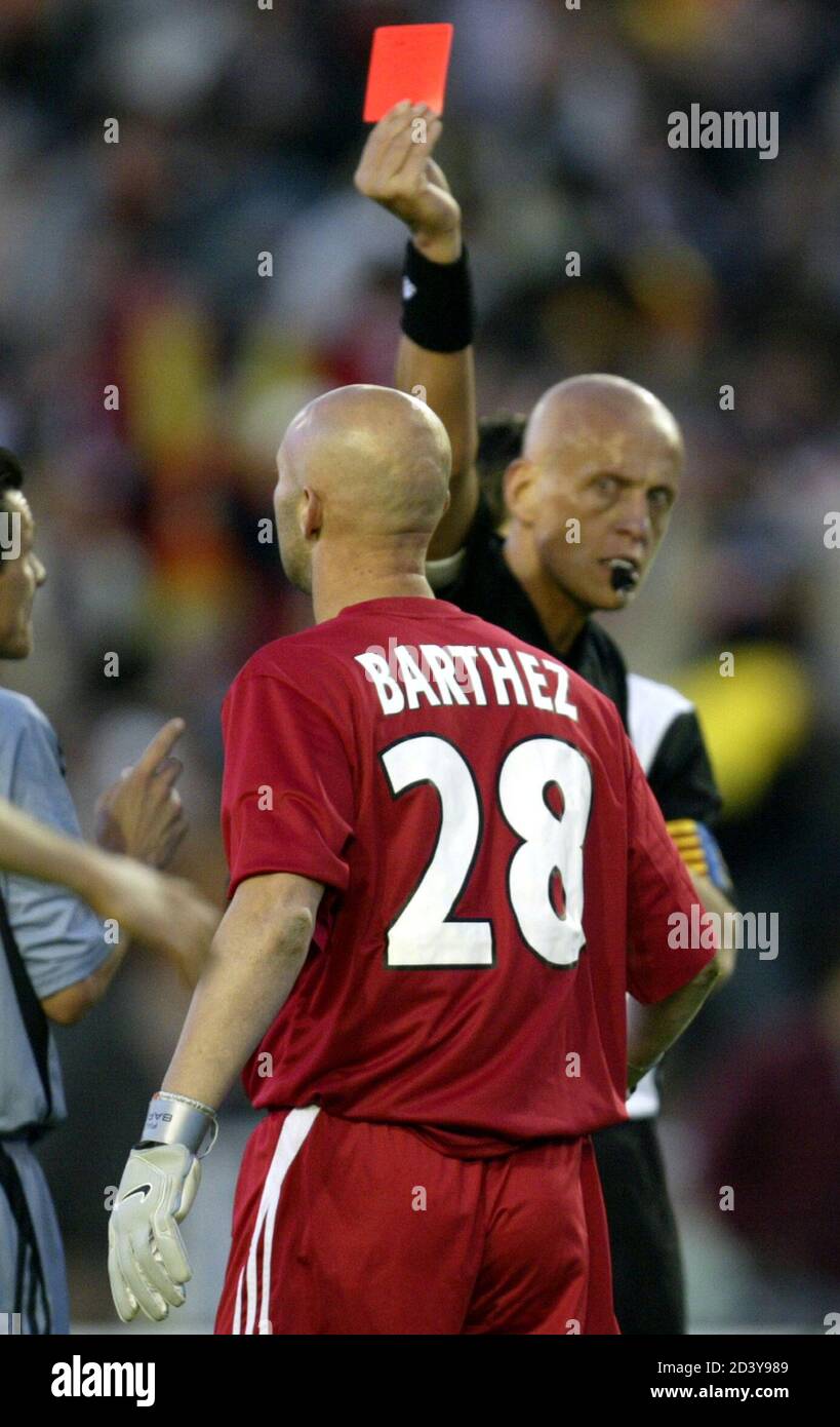 Referee Pierluigi Collina shows red card Fabien Barthez of Olympique during the UEFA Cup final Valencia at the Ullevi Stadium in Gothenburg, May 19, 2004 Stock Photo -