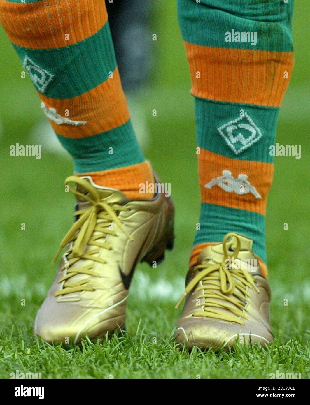 The golden shoes of Brazilian top scorer Ailton of German soccer champion Werder  Bremen are pictured as he walks off the pitch during the German Soccer Cup  final [against second division club