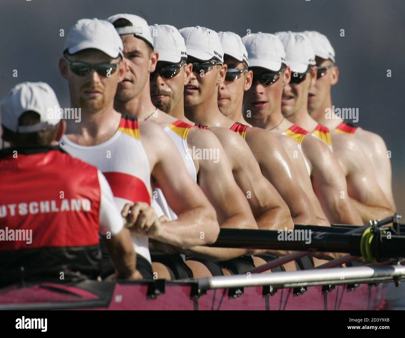 The German men's eights are all in unison as they train at the Schinias Olympic Rowing Centre northeast of Athens August 13, 2004. The Rowing competition for the Athens 2004 Olympic Games begins August 14. REUTERS/Andy Clark  AC/SV Stock Photo