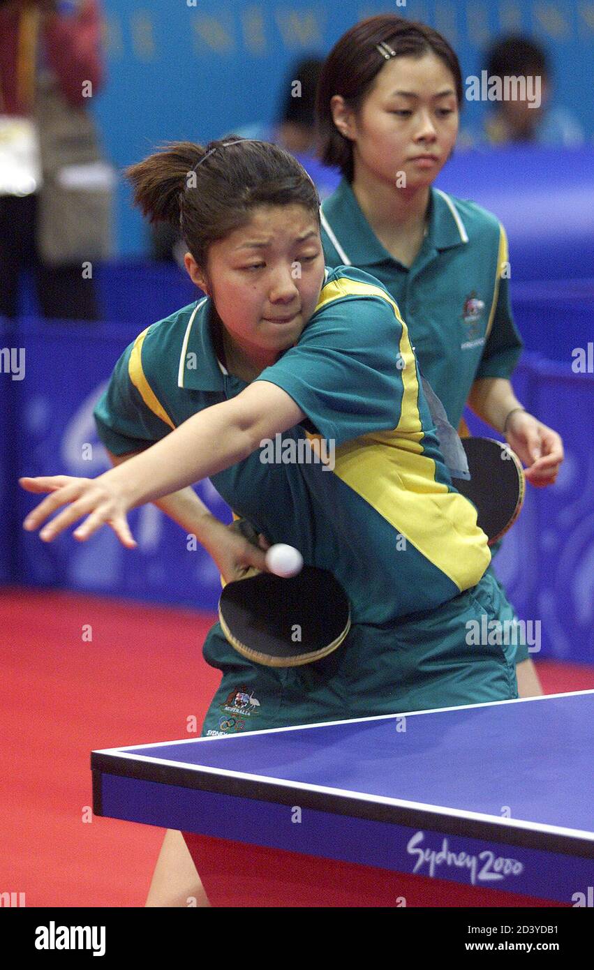 Tennis table players Shirley Zhou (L) and Miao Miao (R) from Australia play  against of Judith Herczig and Jia Liu from Austria during the women doubles  preliminarires at the Sydney 2000 Olympic